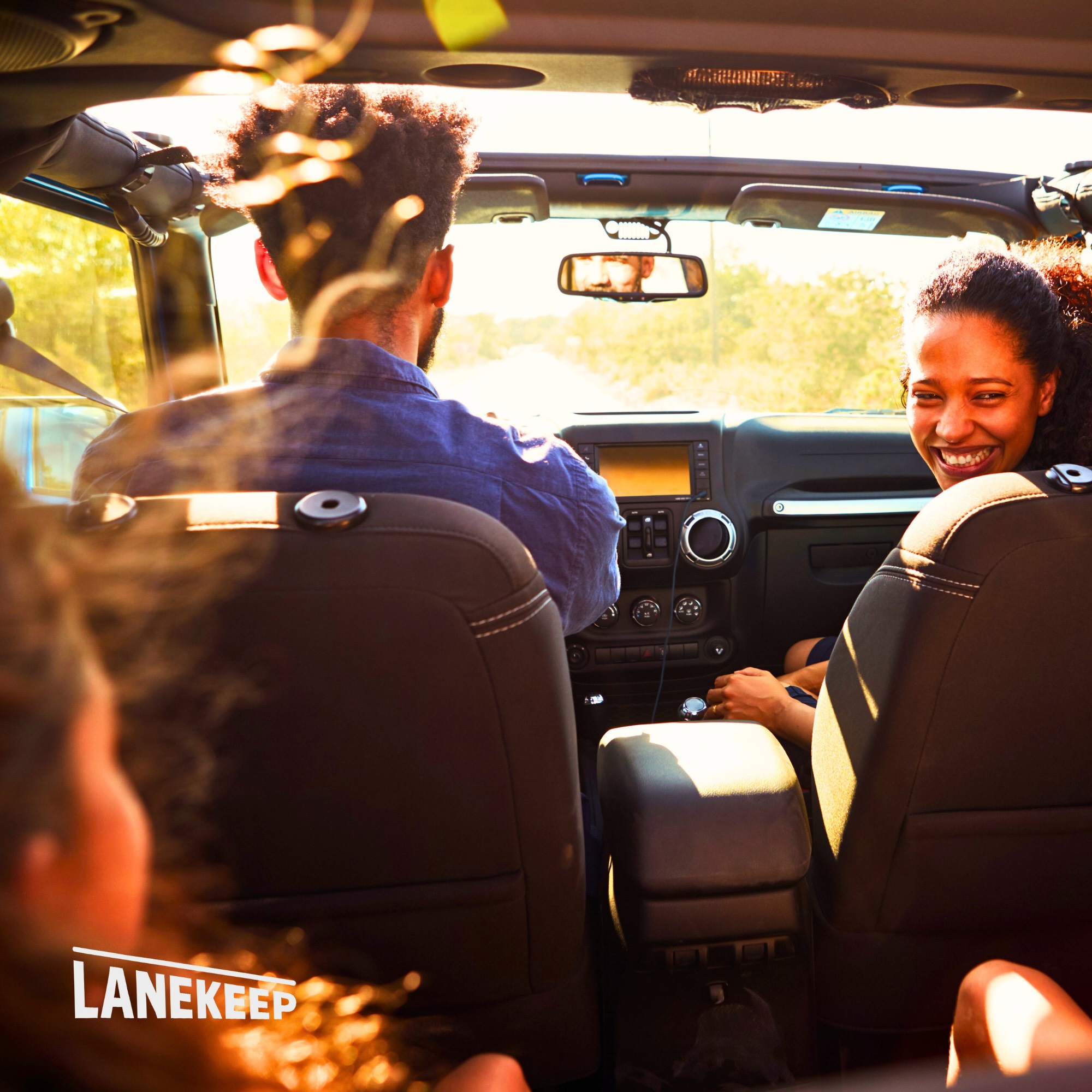 Happy couple in car